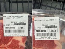 Two packaged beef rib steaks with label details: left package shows boneless rib steak, product of Australia, 0.936 kg and a total of $24.51; right package shows beef boneless rib steak, 1.144 kg, total $80.69 (Real Canadian Superstore).