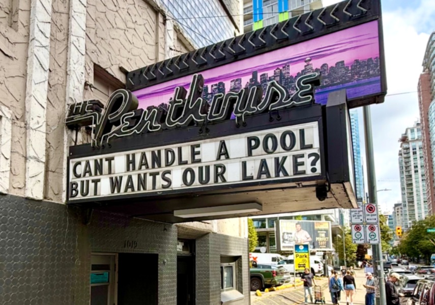 стрип клуб | Наш Ванкувер The Penthouse marquee outside a city building, with the sign reading: "CANT HANDLE A POOL BUT WANTS OUR LAKE?" pedestrians and street scene in the background.