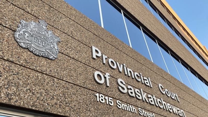 Provincial Court of Saskatchewan building facade with crest and street address 1815 Smith Street