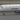 Porter Airlines airplane nose and cockpit with 'porter' logo visible on the fuselage on the taxiway edge of the runway